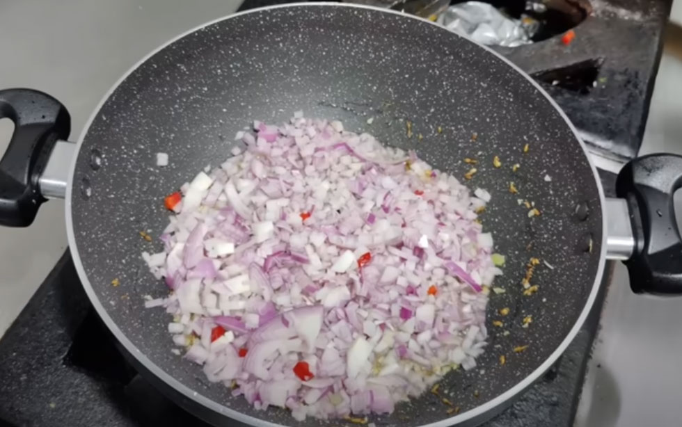 onion cumin in pan